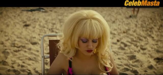Emmy Rossum ’s Swimsuit Scene In Angelyne - Photo 2 of 5
