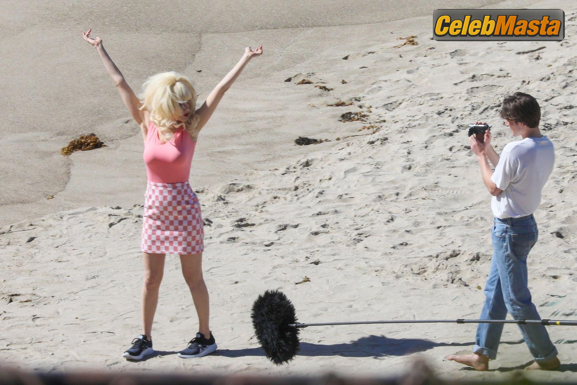 Emmy Rossum Emmy Rossum Gallery: Films Scenes as the Iconic Angelyne on the Beach in Malibu - Photo 5 of 60